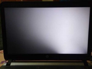 white spot on screen, why is there a white spot on my laptop screen, white dots on screen, white spot on monitor,